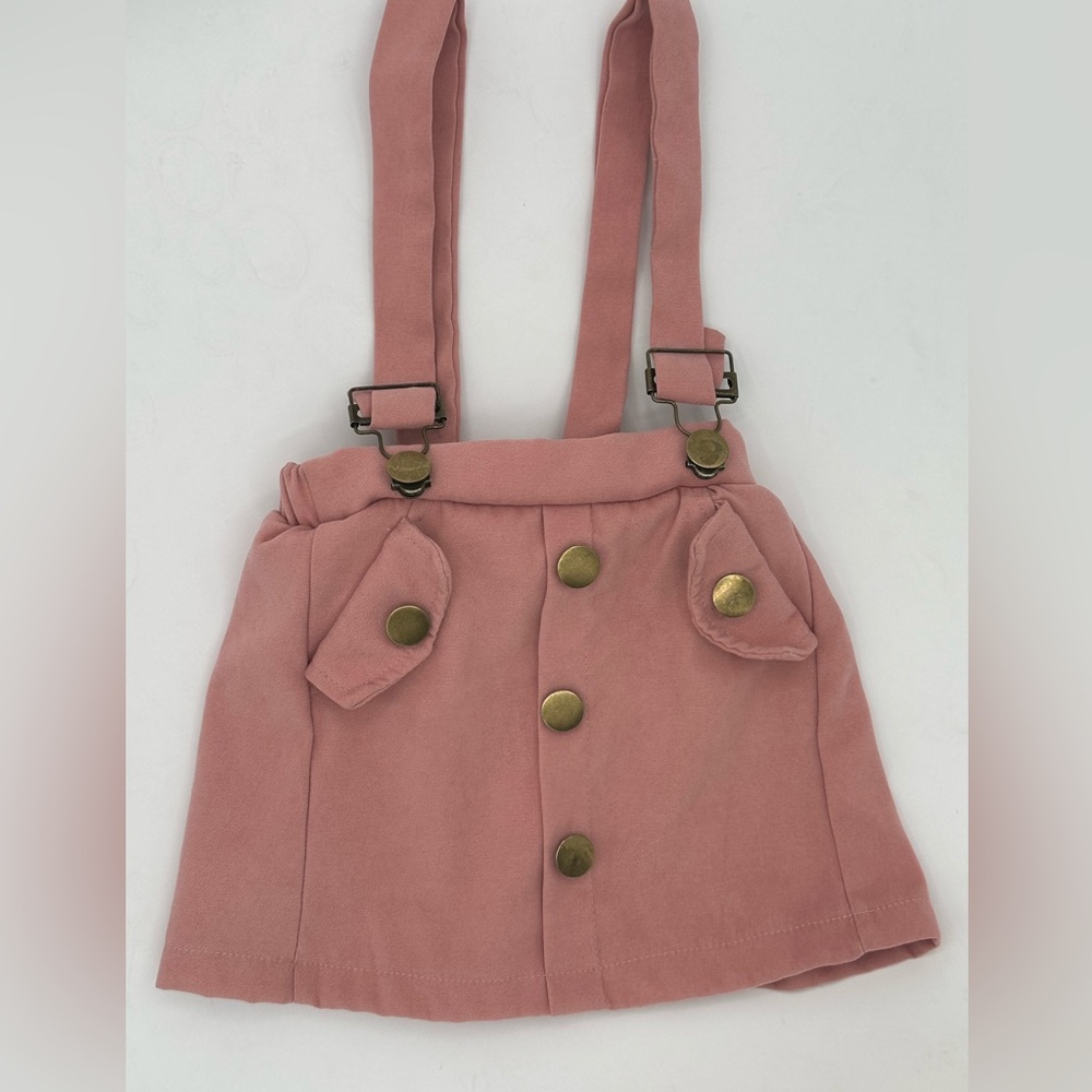 Adorable toddler skirt with overall style straps.